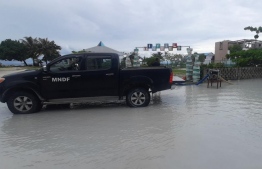 MNDF provides assistance in draining water from affected islands-- Photo: MNDF