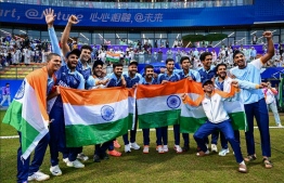 India's players celebrate their victory in the men’s final cricket match between Afghanistan and India during the Hangzhou 2022 Asian Games in Hangzhou, in China's eastern Zhejiang province on October 7, 2023.
Ishara S. KODIKARA / AFP
