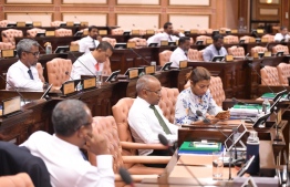 Parliamentarians during a parliament session.-- Photo: Majlis Secretariat
