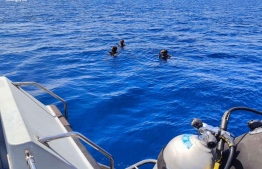 Divers on their search for Yoosuf Ibrahim, who went missing while on a solo fishing trip -- Photo: MNDF