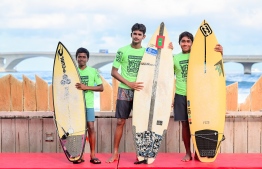 Team Sayyid members Nooh (R), Saayid (M) and Raain (R), who scored first place in the team event of Sea Sports’ National Junior Surfing Championship on Friday, October 20, 2023-- Photo: Nishan Ali