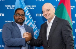 FAM President Bassam Adeel Jaeel (L) with FIFA President Gianni Infantino; the international federation has pledged to disburse USD 300,000 with the strict condition of utilizing the sum towards employee remuneration--