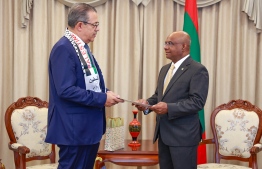 Minister Shahid presents exequatur to Honorary Consul Khalaf.-- Photo: Foreign Ministry