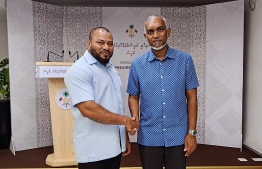 President-elect Dr. Mohamed Muizzu (R) meets with President of the Bodybuilding Association Ibrahim Hameed