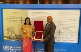 WHO South East Asia Director Dr Poonam presents award to Health Minister Naseem.-- Photo: Health Ministry