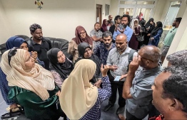 Public gathered at the Housing Ministry to protest against the method of scoring in the Gedhoruveriya housing list.-- Photo: Nishan Ali / Mihaaru