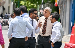 Members of The Democrats and MDP outside the Supreme Court before Tuesday's hearing of the MDP-filed constitutional lawsuit commenced-- Photo: Mihaaru