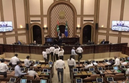 Commotion inside parliament chamber during Sunday's sitting over Afeef's decision to dismiss the no-confidence motion against Speaker Mohamed Nasheed--