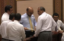 Finance Minister Ameer submitting the budget in parliament on Tuesday.