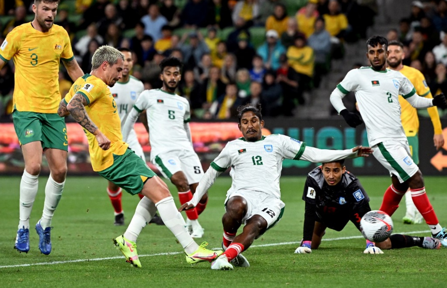 އޮސްޓްރޭލިއާ އާއި ބަންގްލަދޭޝް ބައްދަލުކުރި މެޗުގެ ތެރެއިން.-- ފޮޓޯ: އޭއެފްޕީ