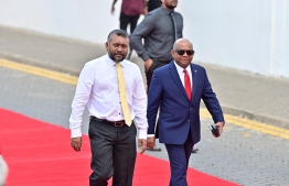 Minister of Economic Development Fayyaz Ismail (L) and Minister of Foreign Affairs Abdulla Shahid (R) attends the oath taking ceremony of Dr. Mohamed Muizzu.