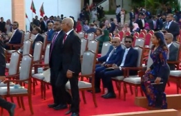 The new Minister of Defense Mohamed Ghassan stands up to show respect to outgoing President Ibrahim Mohamed Solih--