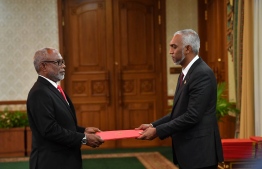 President Dr. Mohamed Muizzu presents letter of appointment to Abdul Raheem Abdulla as the president's Special Advisor-- Photo: President's Office