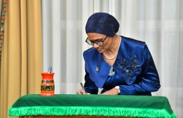 The new Minister of Higher Education, Labor and Skills Development Dr. Mariyam Mariya signs on the letter of appointment-- Photo: President's Office