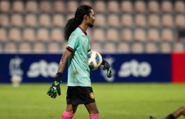 Farish substituted for goal keeper after UV keeper Fairoosh sustained injuries.-- Photo: Fayaz Moosa / Mihaaru