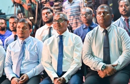 Ministers Adam Naseer (R) and Mohamed Shafeeq (L) attending the 'Magey Solar' inauguration with Minister Thoriq Ibrahim (C).-- Photo: Fayaz Moosa / Mihaaru