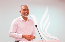 President Dr. Mohamed Muizzu speaks at the ceremony held on Wednesday evening to open PNC's new office; at the ceremony, President Muizzu expressed confidence of securing parliament's super-majority-- Photo: Mihaaru
