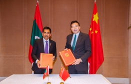 Minister of Economic Development Mohamed Saeed with a senior official of the Chinese government; China agreed to increase its flight operations to the Maldives and assist in Maldives' development projects-- Photo: X/Mohamed Saeed