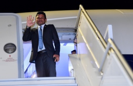 Vice President Hussain Mohamed Latheef on a flight en-route to China: He has arrived in Geneva after concluding his visit to China -- Photo: President's Office