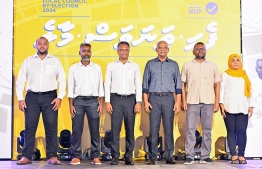 Former President Ibrahim Mohamed Solih (third from Right) with former Minister of Economic Development Fayyaz Ismail (second from Right) with MDP members running for vacant spots in Male' City Council-- Photo: mihaaru