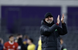 Liverpool's German manager Jurgen Klopp applauds at the end of the UEFA Europa League football match between Union Saint Gilloise and Liverpool FC at the Lotto Park in Brussels on December 14, 2023. -- Photo: Kenzo Tribouillard / AFP
