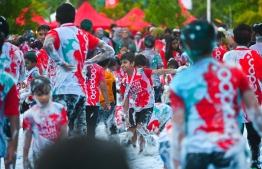 Participants of Ooredoo Fun Run enjoy the foam party at the event -- Photo: Fayaaz Moosa