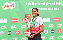 Fasooha poses with the Best Female Athlete trophy: This is the first time she has won the Best Athlete Award in a domestic tournament -- Photo: Fayaaz Moosa