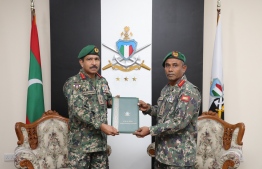 Chief of Defense Force Lieutenant General Abdul Raheem (L) with the new Coastguard Commandant Colonel Saleem (R)-- Photo: MNDF