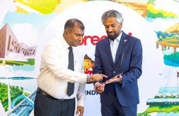 Minister for Language, History, and Culture, Adam Naseer launches Ooredoo's 2024 calendar -- Photo: OOredoo