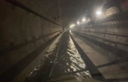 A frame grab taken from a handout video footage posted on the Southeastern Railway's X account on December 30, 2023  shows flooded water in a tunnel used by Eurostar trains, near Ebbsfleet International station in Kent, southern England. Eurostar trains were cancelled on December 30, 2023 due to flooded tunnels in southern England, causing misery for New Year travellers in the second major disruption in 10 days. -- Photo by Handout / Southeastern / ESN / AFP