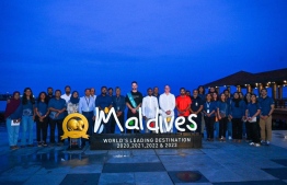 Tourism Minister Ibrahim Faisal and senior officials of the ministry welcome the first tourist to the Maldives this year at Velana International Airport. -- Photo: Immigrations