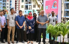 Aishath Azima Shakoor, who is running for Mayor of Male' under the PPM/PNC ticket (M) along with President Dr. Mohamed Muizzu (R) and Vice President Hussain Mohamed Latheef at the campaign event held in Vilimale' on January 6, 2024 --