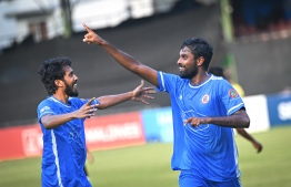 Masodi's Azzam (Right) who scored the goal against JJ with teammate Abdulla Ziyan.-- Photo: Nishan Ali / Mihaaru