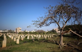 This photograph taken on January 16, 2024 shows a view of the English Cemetery in the village of al-Zawaida in the central Gaza Strip, amid ongoing battles between Israel and the Palestinian group Hamas. -- Photo: AFP