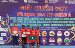 Maldives tennis team with their coach -- Photo: Vietnam Tennis Association