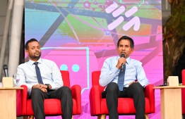 Minister of Construction and Infrastructure Abdulla Muttalib (L) listens while Minister of Economic Development and Trade Mohamed Saeed answers a question at the Ahaa Forum on January 25, 2024 -- Photo: Nishan Ali