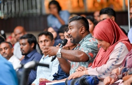 A citizen attending the Ahaa Forum asking the cabinet members a question on Thursday, January 25, 2024 -- Photo: Nishan Ali