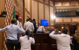 Some government-affiliated members trying to stop Speaker Aslam from entering the parliament chamber --