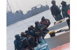 The Indian Coastguard lined up all the crew members at the stern of the boat, with officers standing guard over them.