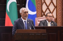 President Dr Mohamed Muizzu delivers his Presidential Address earlier this year in the presence of Parliament Speaker Mohamed Aslam.