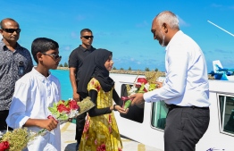 President Muizzu greets the residents of Thaa atoll Dhiyamigili during his Thaa atoll tour. -- Photo: President's Office