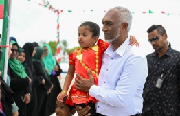 President Muizzu greets the residents of Thaa atoll Dhiyamigili during his Thaa atoll tour. -- Photo: President's Office