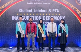Amna with fellow school students at the school's inauguartion ceremony -- Photo: Hoarafushi School