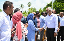 President Dr Muizzu shaking hands with the people of Addu who greeted him upon arrival