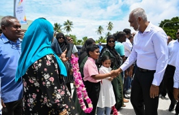 Residents of Addu City welcome President Dr. Mohamed Muizzu during his first visit to Addu after assuming office. -- Photo: President's Office