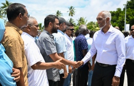 Residents of Addu City greet President Dr. Mohamed Muizzu during his first visit to Addu after assuming office. -- Photo: President's Office