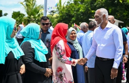 Residents of Addu City greet President Dr. Mohamed Muizzu during his first visit to Addu after assuming office. -- Photo: President's Office