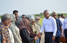 Residents greet President Dr Muizzu on his arrival in Fuvahmulah this afternoon.