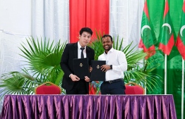 At the signing of the agreement to build an international airport in Thinadhoo.