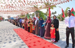 The residential community of HDh. Hanimadhoo extending a welcome to President Dr Mohamed Muizzu upon his arrival -- Photo: President's Office